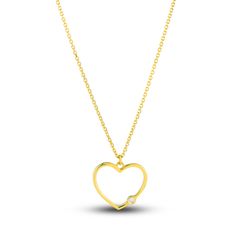 A meaningful traced heart is punctuated with a shimmering round diamond in this sentimental women's pendant necklace. Fashioned in 14K yellow gold, the 18-inch cable chain secures in place with a lobster clasp. Yellow Gold Heart Necklace With Diamond And Delicate Chain, Heart Pendant Diamond Necklace With Delicate Chain For Anniversary, Yellow Gold Minimalist Heart Necklace, Yellow Gold Heart Pendant Diamond Necklace For Gift, Valentine's Day Yellow Gold Diamond Necklace With Heart Charm, Yellow Gold Diamond Necklace With Heart Pendant As Gift, Valentine's Day Yellow Gold Heart Charm Diamond Necklace, Valentine's Day Yellow Gold Open Heart Diamond Necklace, Yellow Gold Heart Necklace With Delicate Chain For Anniversary