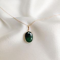 This stunning pendant is set in 14k Solid Yellow Gold with Natural Emerald with utmost precision. It is an unique gemstone pendant for nearly every occasion and is completely hassle-free jewelry. 🔷ABOUT GEMSTONE:  Emerald is often associated with love and romantic relationships. It is believed to promote love, loyalty, and unity, making it a popular choice for engagement and anniversary jewelry. Emerald is often associated with abundance and financial success. It is believed to attract prosperi Elegant Oval Cabochon Emerald Necklace, Luxury Oval Emerald Necklace Gift, Classic Oval Emerald Necklace For Gift, Oval Bezel Set Emerald Necklace As Gift, Oval Bezel Set Emerald Necklace For Gift, Oval Emerald Necklace With Bezel Setting As Gift, Elegant Oval May Birthstone Gemstones, Elegant Oval Emerald Necklace With Bezel Setting, Faceted Oval Pendant Necklace For Gift