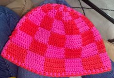 "💕❤️ pink and red checkered bucket hat with a trim. Slightly less flared brim for a cute shape 🌈 cute bright funky look for spring and summer  ❤️ hand wash and air dry  📏 2\" brim, 3\" side height, 7.25\" top" Trendy Pink Brimmed Mini Hats, Fun Pink Beanie Hat, Playful Red Bucket Hat, Playful Red Hat For Spring, Playful Red Spring Hat, Fun Pink Crochet Hat For Beach, Trendy Pink Crochet Cap Hat, Playful Pink Bucket Hat With Curved Brim, Trendy Pink Crochet Cap