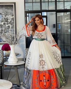 Beautiful Ethiopian Wedding Dress Habesha Dress Handwoven Habesha Kemi – TheEthiopianStore Bollywood Style Maxi Dress For Traditional Ceremonies, Ceremonial White Dabka Dresses, Bohemian Saree-style Wedding Gown, Elegant Ceremonial Dress With Pallu, Elegant Ceremonial Dresses For Navratri, White Cutdana Dress For Traditional Ceremonies, White Bohemian Dress With Cutdana, Fitted Bohemian Gown For Transitional Seasons, Bohemian Ceremonial Gown For Eid