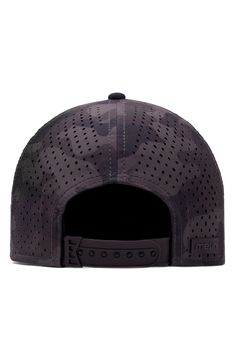 a black hat with holes on it