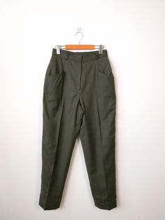 Vintage Women's Grayish Green High waisted Tapered Wool Pants. Measurements Total Length : 42" Waist              : 27" Hips                : 38" Rise (front)    : 13 1/2" Inseam           : 29" Condition      : Gently used. There's no stains or holes. Good condition.  ※Please read the policy before you purchase※ Vintage Business Casual Bottoms For Fall, Vintage Bottoms For Business Casual Fall Season, Vintage Bottoms For Business Casual In Fall, Vintage Fall Bottoms For Business Casual, High Waist Tapered Pants For Business Casual, Retro Straight Work Pants, Tailored Vintage Bottoms For Fall, Vintage Tailored Bottoms For Fall, Vintage Straight Leg Bottoms For Business Casual