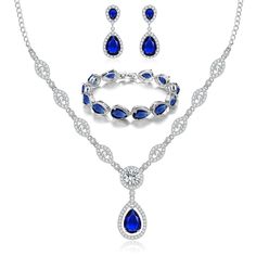 PRICES MAY VARY. ♥ High Quality Material ♥ : This Wedding Jewelry for Bride is made of 18K White Gold Plated & Blue Cubic Zirconia. Highly polished, nickel-free, hypoallergenic and shiny Forever. Our costume jewelry sets for women are suitable for almost all Of sensitive ears. ♥ Jewelry Set Size ♥ : Necklace Length : 20.67"+1.97" (52.5+5cm). Dangle Earrings Size : 0.47"*1.18" (1.2cm * 3cm).Bracelet length: 7.09"(18cm)+extra extension buckle. Lightweight and Comfortable to Wear. Perfect Prom Jewe Prom Jewelry Sets, Wedding Jewelry For Bride, Costume Jewelry Sets, Pendant Necklace Silver, Set Earrings, Prom Jewelry, Earrings Pendant, Teardrop Necklace, Bride Jewellery