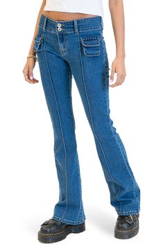 Tiny bellows pockets at the front give unique character to these retro flare jeans imagined with a '00s-inspired low-rise waist. Cotton/polyester/spandex Machine wash, tumble dry Imported Retro Flare Jeans, Jeans Stitch, Womens Low Rise Jeans, Wwe T Shirts, Cowgirl Jeans, Flannel Sweatshirt, Swimwear Dress, Girls Blouse, Bellows