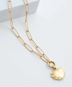 Ardent Locket – Noonday Collection Heart-shaped Gold-tone Charm Necklace With Adjustable Chain, Heart-shaped Metal Chain Necklace With Charms, Gold Plated Heart Charm Necklaces With Lobster Clasp, Heart-shaped Gold Plated Charm Necklace With Lobster Clasp, Dainty Stainless Steel Heart Charm Jewelry, Dainty Stainless Steel Jewelry With Heart Charm, Everyday Brass Jewelry With Heart Charm, Elegant Metal Heart Charm Necklace, Elegant Metal Charm Necklace With Heart Charm