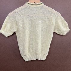 Sweater is in great condition for its age. Minor wear and tear. No rips or stains. Fabric still has a nice feel to it. No tag to indicate brand or size. Measurements are roughly 15x17 when laid flat, and has some play. Because it's likely a children's sweater, the collar isn't the biggest. Measures about 5 inches across and has a little room to expand. Vintage Collared Tops For Winter, Vintage Short Sleeve Tops With Ribbed Collar, Vintage Fitted Top With Ribbed Collar, Vintage Short Sleeve Winter Tops, Short Sleeve Sweater, Pullover Sweater Women, Kids Sweater, Short Sleeved Sweaters, Vintage 60s