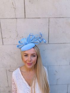 This hat is perfect for special occasions. The bottom of the hat is approximately 15cm across. This comes on a headband  One off piece - only one available Handmade in the UK Many more items like this are available in our shop! Made in the UK - Fitted Light Blue Fascinator For Kentucky Derby, Light Blue Fitted Fascinator For Kentucky Derby, Blue Structured Crown Hat For Spring, Adjustable Light Blue Mini Hat For Kentucky Derby, Blue Spring Hat With Structured Crown, Light Blue Adjustable Mini Hats For Kentucky Derby, Spring Blue Hat With Structured Crown, Light Blue Mini Hat For Kentucky Derby Party, Light Blue Headpiece For Royal Ascot Party