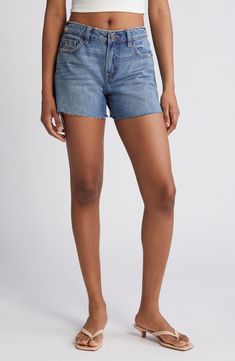 Enjoy the sunshine in casual-cool cutoff shorts made from nonstretch denim with a mid-rise waist, raw hems and hints of distressing. 4" inseam; 9 1/2" front rise Zip fly with button closure Five-pocket style 100% cotton Machine wash, tumble dry Imported Mid-rise Jean Shorts With Frayed Hem, Relaxed Fit Jean Shorts With Frayed Hem, Cotton Cutoff Jean Shorts With Frayed Hem, Medium Wash Jean Shorts With Frayed Hem, Relaxed Fit High-waisted Jean Shorts With Frayed Hem, High-waisted Jean Shorts With Frayed Hem In Relaxed Fit, Cotton Jean Shorts With Frayed Hem, Summer Mid-rise Jean Shorts With Frayed Hem, Spring Jean Shorts With Frayed Hem