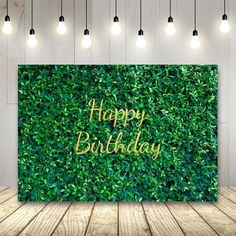 a green birthday card with the words happy birthday in gold foil on top of it