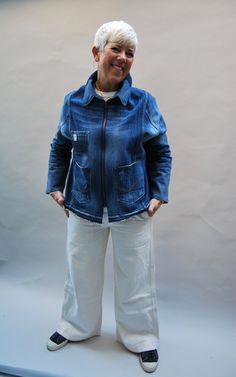 "The clive coat is a oversized zip-up denim jacket with multiple pockets on the front and sleeve. This upcycled collared denim jacket can be styled in multiple ways. Jacket sizing and details: one size, model is a size 12-14(uk) Chest/ Bust 52\" 132cm - Back Length 26\" 66cm\" Sleeves - 21\" 53cm. *Every item at Reclaimed Roundabout is completely unique and one off due to the supply of preloved denim. About us: The Reclaimed Roundabout is run by a mother and daughter team who design and make eve Denim Long Sleeve Biker Jacket With Pockets, Urban Denim Jacket With Zipper For Fall, Spring Denim Blue Outerwear With Zip Fly, Denim Outerwear With Zip Fly For Fall, Oversized Recycled Denim Outerwear With Pockets, Denim Biker Jacket With Zipper Closure, Denim Biker Jacket With Long Sleeves, Relaxed Fit Long Sleeve Outerwear In Recycled Denim, Recycled Denim Long Sleeve Outerwear For Fall