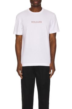 Find MISSONI Short Sleeve T-shirt In White on Editorialist. Missoni Short Sleeve T-shirt in White 100% cotton. Made in Tunisia. Hand wash. Front embroidered logo detail. Lightweight jersey fabric. MSON-MS1. UC24SL01. About the designer: Missoni has grown from a tiny Italian workshop into a worldwide luxury brand that is still family-owned and operated. Founded in 1953 by then newlyweds Ottavio and Rosita Missoni, the first official Missoni collection wasn't presented until 1958 when the couple t Summer Cotton T-shirt With Logo Detail, Logo Detail Short Sleeve Tops For Summer, Cotton Short Sleeve Tops With Logo Detail, Short Sleeve Tops With Logo Detail For Summer, Cotton Tops With Logo Detail And Short Sleeve, Summer T-shirt With Logo Detail And Relaxed Fit, Relaxed Fit T-shirt With Logo Detail For Summer, Summer Cotton Tops With Logo Detail, Relaxed Fit T-shirt With Embroidered Logo For Summer