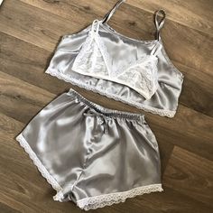 Three piece satin pyjama set with white lace trim. There is an option of crop top & high waisted shorts or normal length top and shorts (if you would like normal length please message me before or after ordering) Please select Pyjama size and then email me your bra size. I make sizes 30-38/A-D Can also come as a two piece with the top and shorts or bralet and shorts. Many other colours are also available, see drop down menu.  Please feel free to message me with any questions. Summer Satin Pajama Party Sets, Satin Sets For Summer Pajama Party, Summer Satin Bedtime Sets, Satin Bedtime Sets For Summer, Fitted Satin Loungewear Sets, Summer Night Satin Sets, Fitted Satin Sleepwear For Pajama Party, Fitted Lace Trim Sets For Pajama Party, Fitted Satin Night Sets