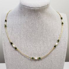 This is a beautiful gold tone beaded necklace rich green jadite and mother of pearl beads.  The necklace is beautiful when worn.  Please see photos for details. Blue Perfume, Puka Shell, Pocket Watch Chain, Shell Bracelet, Rich Green, Copper Bracelet, Stone Gold, Gold Plated Rings, Choker Necklaces