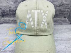 Fully adjustable baseball cap with embroidered three letter abbreviated hometown. Made to order in a smoke free home. Message me for alternate thread colors. Casual Snapback Hat With Custom Embroidery And Flat Bill, Casual Snapback Hat With Custom Embroidery, Casual Trucker Hat With Custom Embroidery, Casual Hats With Custom Embroidery And Curved Bill, Casual Hats With Letter Embroidery And Flat Bill, Casual Flat Bill Hats With Letter Embroidery, Casual Snapback Hat With Letter Embroidery And Flat Bill, Casual Dad Hat With Custom Embroidery, Casual Trucker Hat With Custom Embroidery And Curved Brim