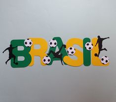 the word brasil spelled out with soccer balls