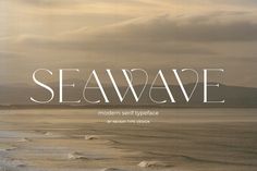 the word seawave is written in white on an overcast day