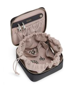 This luxe leather jewelry case is designed to organize earrings, necklaces and rings when traveling or on-the-go. With the option of complimentary monogramming, it makes the perfect gift. Organize Earrings, Travel Jewelry Holder, Necklaces And Rings, Earring Hole, Best Stocking Stuffers, Earring Organizer, Travel Kit, Luxury Towels, Travel Jewelry