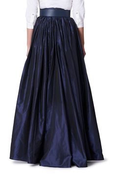 Herrera's legacy lives on in this sweeping ball skirt that's crafted from luminous silk and darkened by a midnight-blue hue. 45 1/2" length ( size 8) Unlined 100% silk Dry clean Made in the USA of imported fabric Designer Clothing Latinx Owned/Founded Gown Silhouette, Whimsical Dress, Taffeta Skirt, Ball Skirt, Silk Taffeta, Icon Collection, Black Midi Skirt, Faux Leather Skirt, Silk Skirt