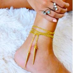 Brand New Boutique Item A Gorgeous Luxury Designer Piece From Jessica Elliott Out Of Los Angeles . 14k Gold Plated Lariat Necklace/Anklet Featuring Dainty Chain With Spiked Ends. Can Be Worn As Shown In Pics Or However You Would Like. Beautiful Piece For Layering , Or Various Boho Looks Any Questions Pls Ask Open To Reasonable Offers Bundle To Save Boho Western Chic Spiked Studded Luxury Gold Lariat Jewelry For Festivals, Gold Lariat Jewelry For Summer, Gold Lariat Necklace For Festival, Adjustable Ankle Wrap Jewelry Gift, Adjustable Ankle Wrap Jewelry As A Gift, Gold Adjustable Dangle Anklets, Gold Lariat Necklace With Adjustable Chain For Festival, Gold Dangle Anklets With Adjustable Fit, Gold Lariat Necklace For Beach