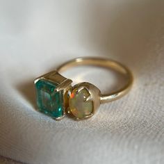 This gorgeous ring is handmade with traditional metalworking techniques Made with an emerald, opal, and 14k yellow gold Size 7.5 but inquire for size adjustments Emerald And Opal Ring, Opal Wedding Rings, Malachite Rings, Ocean Jewelry, Opal Ring, Jewelry Inspo, Emerald Ring, Pretty Jewellery, Opal Rings