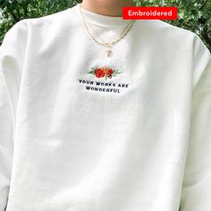 "💐 \"Your works are wonderful\" embroidered on a comfy cute crewneck. If you're on the lookout for both style and comfort, this fleece sweatshirt is the perfect choice. And with up to 5% recycled polyester in components, you'll be taking a little step closer to a more earth-friendly way of life. *SIZES ARE UNISEX * 50% cotton, 50% polyester (up to 5% recycled polyester, made from plastic bottles) * Fabric weight: 7.8 oz/y² (264.5 g/m²) * Patented low-pill, high-stitch density PrintPro® XP fleec White Floral Embroidered Sweatshirt For Fall, Trendy Sweatshirt With Letter Embroidery For Spring, Trendy Oversized Embroidered Sweatshirt, Everyday Embroidered Sweatshirt For Fall, Everyday Embroidered Fall Sweatshirt, Embroidered Everyday Sweatshirt For Fall, Embroidered Sweatshirt For Everyday Fall Wear, White Relaxed Fit Sweatshirt With Floral Embroidery, White Floral Embroidery Sweatshirt With Relaxed Fit