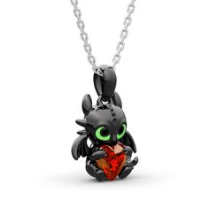 Playful, inquisitive and intelligent, this fictional dragon is indisputably special. Beautifully handcrafted in sterling silver, this necklace in Hug Me® collection features a brilliant heart cut stone hugged by a dragon, which is designed to be so lovely and super-cute. His 3D wings, ears and bright green eyes are captured in amazing detail as he on your neck. You will find more adorable and creative designs in our Hug Me® collection.Carat Weight: 1.4 ctStone Size: 6*6 mmStone Type: Jeulia® Sto Elegant Dragon Design Necklace As A Gift, Elegant Dragon Design Necklace As Gift, Elegant Dragon Design Necklace Gift, Fantasy Style Silver Necklaces For Gifts, Silver Fantasy Necklace For Gifts, Fantasy Style Silver Necklaces As A Gift, Fantasy Style Silver Necklace As Gift, Collectible Black Jewelry With Dragon Design, Black Jewelry With Dragon Design Collectible