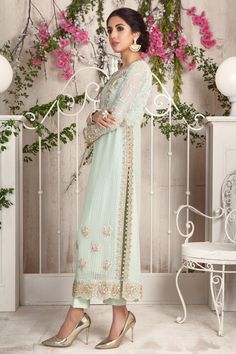 Add style to your wardrobe with this mint no., over a canvas of embroidered chiffon featuring floral embroidery in dabka, naqshi, pearls and beads. Hand crafted tassel and loop button details on side hem for additional style quotient. This stunning shirt is paired with straight pant and sequin embellished dupatta with 3d floral details to complete the look. Shirt Fabric: Pure Embroidered ChiffonShirt Length: 48”Pant Fabric: Pure Raw SilkDupatta Fabric: Pure ChiffonShirt ,Pant & Dupatta Color Pakistani Formal Dresses, Embroidered Chiffon, Pure Chiffon, Mint Wedding, Stylish Dresses For Girls, Pakistani Dress Design, Pakistani Designers, Shirt Fabric, Wedding Wear