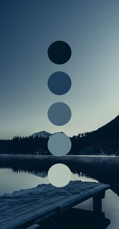 a dock with five circles floating in the air