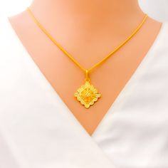 This opulent 22k gold square necklace, weighing 5.4 grams, offers a bold and eclectic design in radiant yellow gold. The 18-inch necklace, featuring a 1.25-inch drop, is secured with a sturdy lobster ring lock for comfortable wear. Perfect for those who embrace unique and artistic pieces, this necklace adds a touch of luxury and individuality to any outfit. Its striking square motif and glowing finish make it a versatile statement piece, suitable for both everyday elegance and special occasions. PRODUCT DETAILS Gold Purity(karat): 22k Gold Weight(grams): 5.4 Item Finish: Yellow Gold Necklace Length: 18" Drop Length: 1.25" Lock Style: Lobster Ring Lock Bridal Jewelry Necklace, Precious Stones Rings, Diamond Pendant Sets, Modern Bracelets, Square Necklace, Mens Gold Rings, Fancy Necklace, Fancy Rings, Everyday Elegance