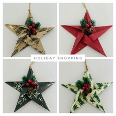 four star ornaments with pine cones and holly on them, each decorated in different colors