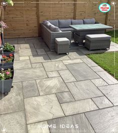 an outdoor patio with seating and plants