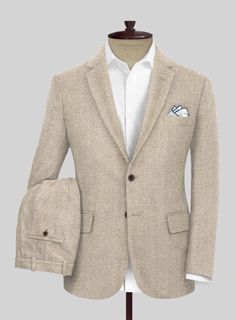 Enrich your wardrobe with our Naples Wide Herringbone Beige Tweed Suit, which offers a distinctive approach to traditional design with contemporary accents. Crafted from pure wool fabric, it features a herringbone pattern and its beige color elevates your style and personality, exuding a sense of richness. This ensemble stands as an impeccable and versatile choice, perfect for a diverse range of occasions. 
  Look Includes    Naples Wide Herringbone Beige Tweed  Fabric  Two Button Jacket Style Gray Tweed Suit, Lavender Suit, Brown Tweed Suit, Grey Tweed Suit, Light Grey Suits, Tweed Suit, White Herringbone, Cozy Design, Paisley Shirt