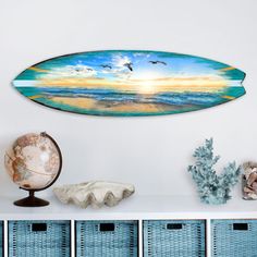 a surfboard is hanging on the wall next to baskets and vases with plants