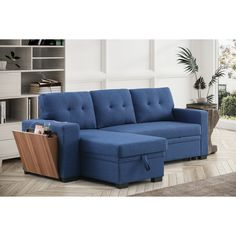 a blue sectional sofa with storage underneath it and a wooden end table next to it