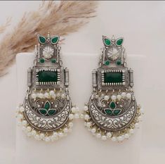 These beautiful statement emerald green dangler earrings will compliment any outfit! Made in high quality German silver, these are light weight and easy to wear.  For any queries, please feel free to contact us. Happy shopping! Earring Indian, Long Earring, Pakistani Wedding Outfits, Dangler Earrings, Festive Wear, German Silver, Pakistani Wedding, Indian Jewellery, Festival Wear