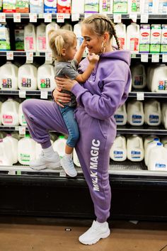 TLMB X Jenny Tamas Collaboration Part 2 Empowering breastfeeding moms everywhere! Materials: 100% cotton face. Inner Fleece 35% cotton / 65% polyester. Pair with our matching Milk Magic crop hoodie for the perfect comfy sweatsuit. Our Milk Magic© design in collaboration with Jenny Tamas printed on the leg of our custom purple crop joggers. These joggers have POCKETS!!! Fit: Runs true to size. Jenny is 5’ 5” 135 lbs wears Medium hoodie / Medium jogger. Lindsay is 5’ 8” 175 lbs wears Large hoodie Large Hoodie, 135 Lbs, Magic Design, Cropped Joggers, Crop Hoodie, Baby Sale, Cropped Hoodie, Mom And Baby, Sales Gifts