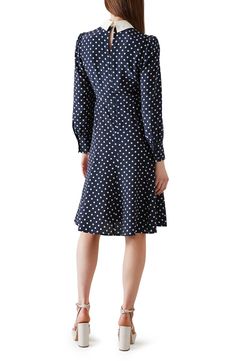 Decorative buttons add a touch of sparkling sophistication to a long-sleeve silk dress featuring bright polka dots and a contrasting point collar. Hidden back-zip closure Point collar Long sleeves with button cuffs 100% silk Dry clean Imported This brand is certified with the Butterfly Mark, which identifies luxury brands that adhere to social and environmental best practices
 This brand meets Nordstrom Responsible Brands criteria: brand adheres to responsible social and environmental practices Long Sleeve Silk Dress, Lk Bennett, Design Clothes, Decorative Buttons, Luxury Brands, Fit Flare Dress, Fit & Flare, Silk Dress, Flare Dress