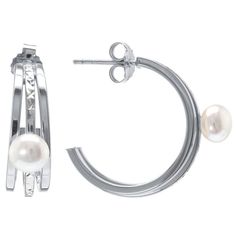 Elegance abounds with these Judy Crowell Sterling Silver Textured Freshwater Cultured Pearl Triple Hoop Earrings. Click on this JEWELRY & WATCHES GUIDE to learn about fit, styles, materials and more! Elegance abounds with these Judy Crowell Sterling Silver Textured Freshwater Cultured Pearl Triple Hoop Earrings. Click on this JEWELRY & WATCHES GUIDE to learn about fit, styles, materials and more! FEATURES 24 mm x 23 mm Backings: post Metal: sterling silver Finish: diamond-cut Packaging: velvety Elegant Small Hoop Jewelry With Bail, Formal White Gold Hoop Pearl Earrings, White Gold Hoop Pearl Earrings For Anniversary, White Gemstones, Triple Hoop Earrings, Post Metal, Pearl Details, Jewelry Earrings Hoops, Cultured Pearls