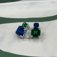 Asscher Cut And Cushion Cut Sapphire & Emerald Gemstone Stud Earrings, 10K White Gold Earrings, Unique Alternative Gemstone Earrings, Gifts ✿ Specification ✿ ------------------------- Gemstone Details: ⇨ Type: Sapphire, Emerald ⇨ Shape: Cushion Cut, Asscher Cut ⇨ Color: Blue ⇨ Stone Size: 8 mm, 4 mm ❁ You Can be Planning to place your custom order, Then Do it by onwards. ↣ handmade moissanite made by craftsman with full of festinating and brilliance. As well Stone is produced with excellent cuts, grades and superior quality for our customers. ↣ Metal Preference: 925 Sterling Silver/10KT/14KT/18KT ↣ Metal Tones: Yellow Gold, White Gold, Rose Gold ❁ Stone types & choices: ↣ Natural Diamond, Lab-grown diamond, Precious and semi-precious gemstones ❁ Stone Shape Options: ↣ I will supply all cat