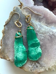 All done in gold filled these beautiful earrings are OOAK! Dangle length is 56mm. Gorgeous genuine green chrysoprase 💜 Light weight and comfortable in the ear. Gold filled metal and ear wire. Elegant Nickel-free Chrysoprase Jewelry, Gold Chrysoprase Earrings For Gift, Gold Chrysoprase Earrings As A Gift, Unique Gold Jade Earrings, Handmade Elegant Chrysoprase Earrings, Elegant Handmade Chrysoprase Earrings, Green Brass Earrings With Natural Stones, Gold Wire-wrapped Jade Earrings, Unique Green Wire Wrapped Earrings