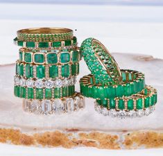 Our emerald eternity bands in 14K or 18K yellow, rose, and white gold are set with shimmering multi-colored sapphires and a bezel setting. Wear these alone or stacked with multi-colors and/or other rings from our collection. We have varying sizes in stock, you can order to your specific size of stones, colors and gold--most of our special order eternity bands can be completed with in a few days to one week. 14K Gold or 18K gold Multi-color sapphires and gemstones 23 emeralds (depending upon size Luxury Stackable Emerald Cut Emerald Ring, Luxury Stackable Emerald-cut Emerald Ring, Luxury Green Emerald Stackable Ring, Luxury Stackable Emerald Jewelry, Luxury Diamond Emerald Stackable Ring, Luxury Eternity Band With Bezel Setting As Gift, Luxury Bezel-set Eternity Band As Gift, Green Gemstone Eternity Band Fine Jewelry, Luxury Bezelled Eternity Band As Gift