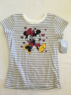 NWT Disney store Minnie Mickey Mouse Tee Shirt Girls 10/12 Stripe Thank you. All come from Smoke Free and pet Free home. Disney store exclusive. 95% cotton 5% polyster Minnie Mouse Cotton T-shirt, Cute Minnie Mouse Crew Neck Shirt, Cute Minnie Mouse Shirt With Crew Neck, Cotton Minnie Mouse T-shirt With Short Sleeves, Cute Minnie Mouse Cotton Top, Cotton Minnie Mouse Short Sleeve T-shirt, Cotton Minnie Mouse Shirt With Short Sleeves, Cute Mickey Mouse Cotton T-shirt, Playful Minnie Mouse Cotton T-shirt