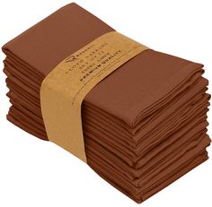 a stack of brown napkins with a label on it