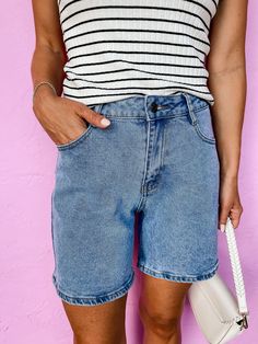 Get your mom shorts game on point with the Berkeley Bermuda Denim Mom Shorts! With a stretchy high waist for ultimate comfort, these shorts feature unique pocket details and a relaxed fit for a laid-back style. Perfect for summer, these bermuda shorts are a must-have in your wardrobe. High waisted No distressing Button and zipper front closure Fit: Relaxed; No stretch except in waist Waist: Small-28in Medium-30in Large-32in XLarge-34in Length: Small-16in Medium-17in Large-18in XLarge-19in Rise: Wedding Guest Accessories, Denim Mom Shorts, Athleisure Summer, Unique Pockets, Mom Shorts, Laid Back Style, Your Mom, Game On, Bermuda Shorts