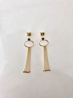 FREE SHIPPING, 14k yellow solid gold tassel earrings. It can be produce 14k rose gold and white gold. DETAILS Tassel earring length is approx. 5 cm (1.97 inch). MATERIALS All our jewelry are made of 14 karats solid gold. We like to use yellow gold, white gold and rose gold to please your color of choice. Use the drop-down material menu to find your favorite option. PACKAGING This earring is carefully packaged in a nice and elegant gift box. PRODUCTION TIME Each earrings are handcraft to order an Elegant Yellow Gold Earrings With Tassels, Yellow Gold Drop Tassel Earrings, Yellow Gold Dangle Tassel Earrings As Gift, Yellow Gold Tassel Dangle Earrings, Yellow Gold Dangle Earrings With Tassels, Unique Gold Earrings, Earring Long, Gold Tassel Earrings, Long Earring