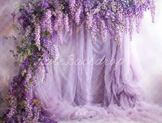 purple flowers are growing up the side of a sheer fabric covered backdrop with text overlay