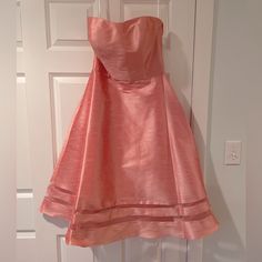 Alfred Sung Strapless Dress, Coral, Size 10. Never Worn, Brand New Condition With Tags Attached. Evening A-line Fit And Flare Strapless Dress, Fit And Flare A-line Strapless Evening Dress, Strapless Wedding Dress For Spring, Evening Strapless A-line Fit And Flare Dress, Evening Fit And Flare A-line Strapless Dress, Strapless Midi Dress With Lined Bodice For Evening, Strapless Lined Spring Dress, Fitted Strapless Midi Sundress, Strapless Mini Dress With Fitted Bodice For Dress Down