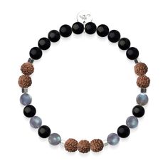 Discover the spiritual connection with this Rudraksha Mala Bracelet from NOGU. Featuring a combination of Rudraksha, Obsidian, and Labradorite beads, this bracelet is strung on a clear elastic cord with a circumference of 7.8 inches. The metal finish is silver, while the metal base is stainless steel. The beads range in size to 6mm. Rudraksha beads, revered as the tears of Shiva, are believed to connect the wearer to pure consciousness and balance the mind and emotions. Wear this unisex bracelet Spiritual Rondelle Beaded Bracelet With Spacer Beads, Meditation Onyx Beaded Bracelets With Round Beads, Meditation Onyx Beaded Bracelets, Spiritual Onyx Beaded Bracelets With Round Beads, Onyx Beaded Bracelets For Meditation, Fusion Style Beaded Bracelets As Gift, Spiritual Onyx Beaded Bracelets Gift, Fusion Style Hand-strung Beaded Bracelets As Gift, Fusion Style Polished Beaded Bracelets As Gift