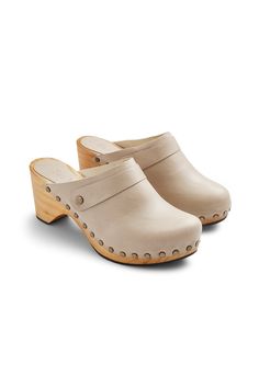 Classic high heel clogs in a new bone leather look great with a bare foot or with any of our socks. Modern, with a touch of edge and plenty of comfort. 2 7/8" heel height authentically crafted from pine wood. Leather upper, leather lined. Made in Spain. Fit is true to size. Half sizes should order up. Pre-order now for end of April shipping. Save SaveSave High Heel Clogs, Cashmere Socks, Clog Heels, Wooden Shoes, Leather High Heels, Leather Clogs, Sandals Brands, Clogs Shoes, Mens Socks