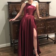 Beautiful Sherri Hill One Shoulder Gown From The Spring 2020 Collection In A Gorgeous Maroon/Burgundy Color. This Dress Has Been Altered To Fit Someone Who Is Between 5’4” And 5’2”. One Shoulder Gown, Sherri Hill Dresses, 2020 Design, Formal Gown, Sherri Hill, Burgundy Color, Formal Gowns, Design Color, Dress First